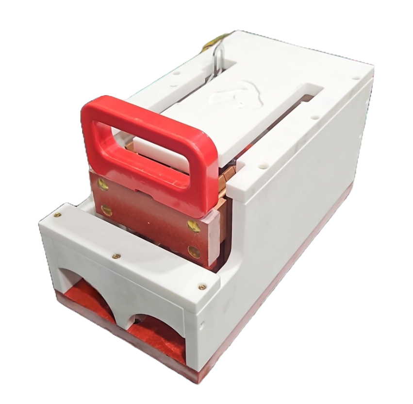 Detailed view of a custom fabricated part, likely a switch cover.